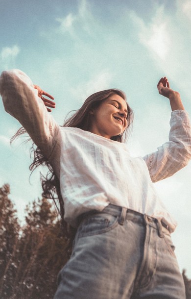 happy girl with hands in the air